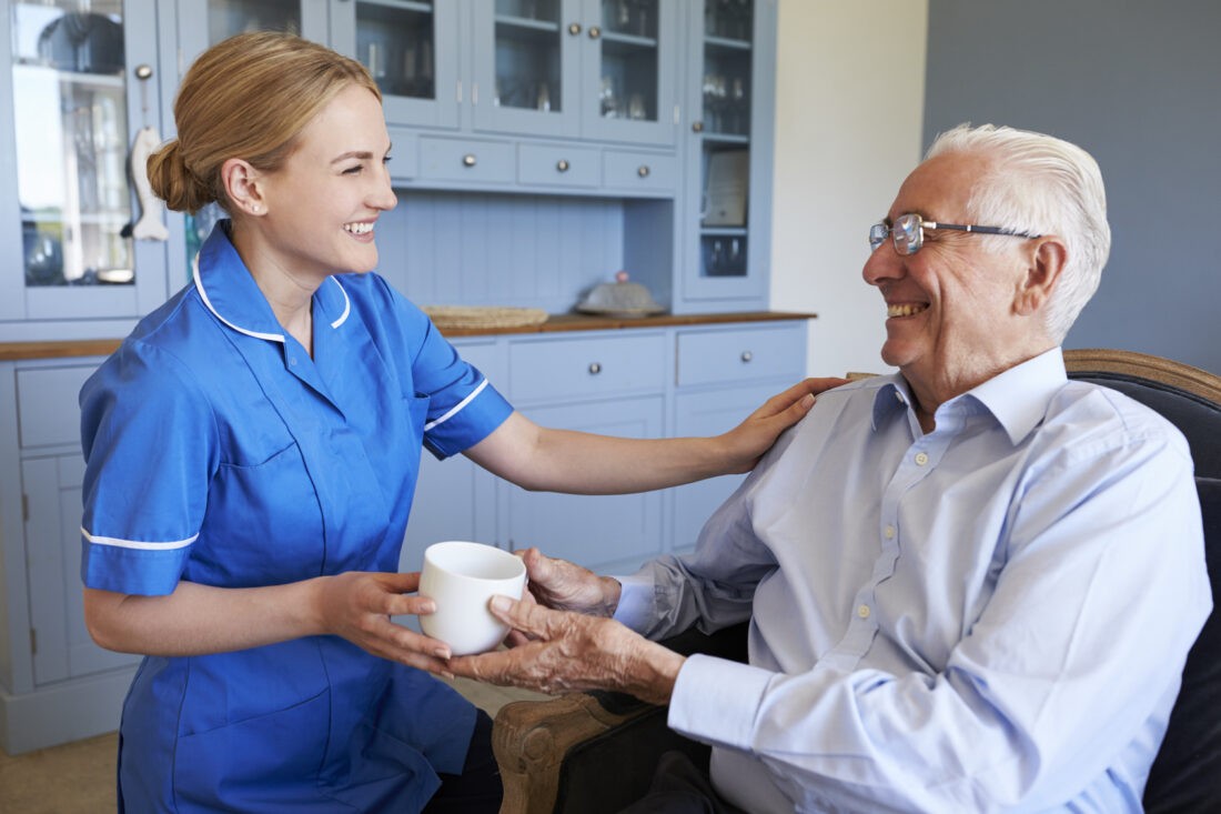 Care assistant with her patient